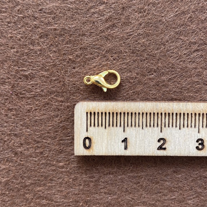 Застежка карабин желтое золото, 9 мм.